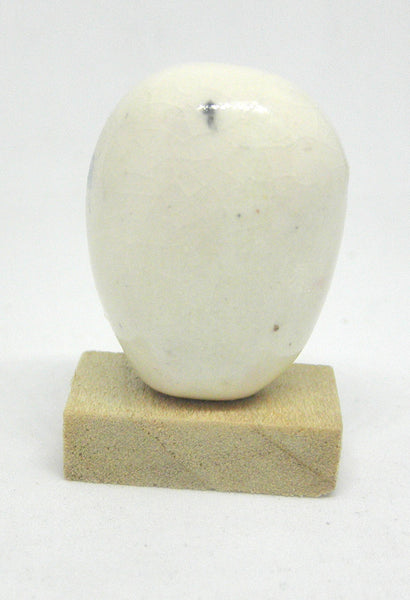 Miniature ceramic collector's head with pastels