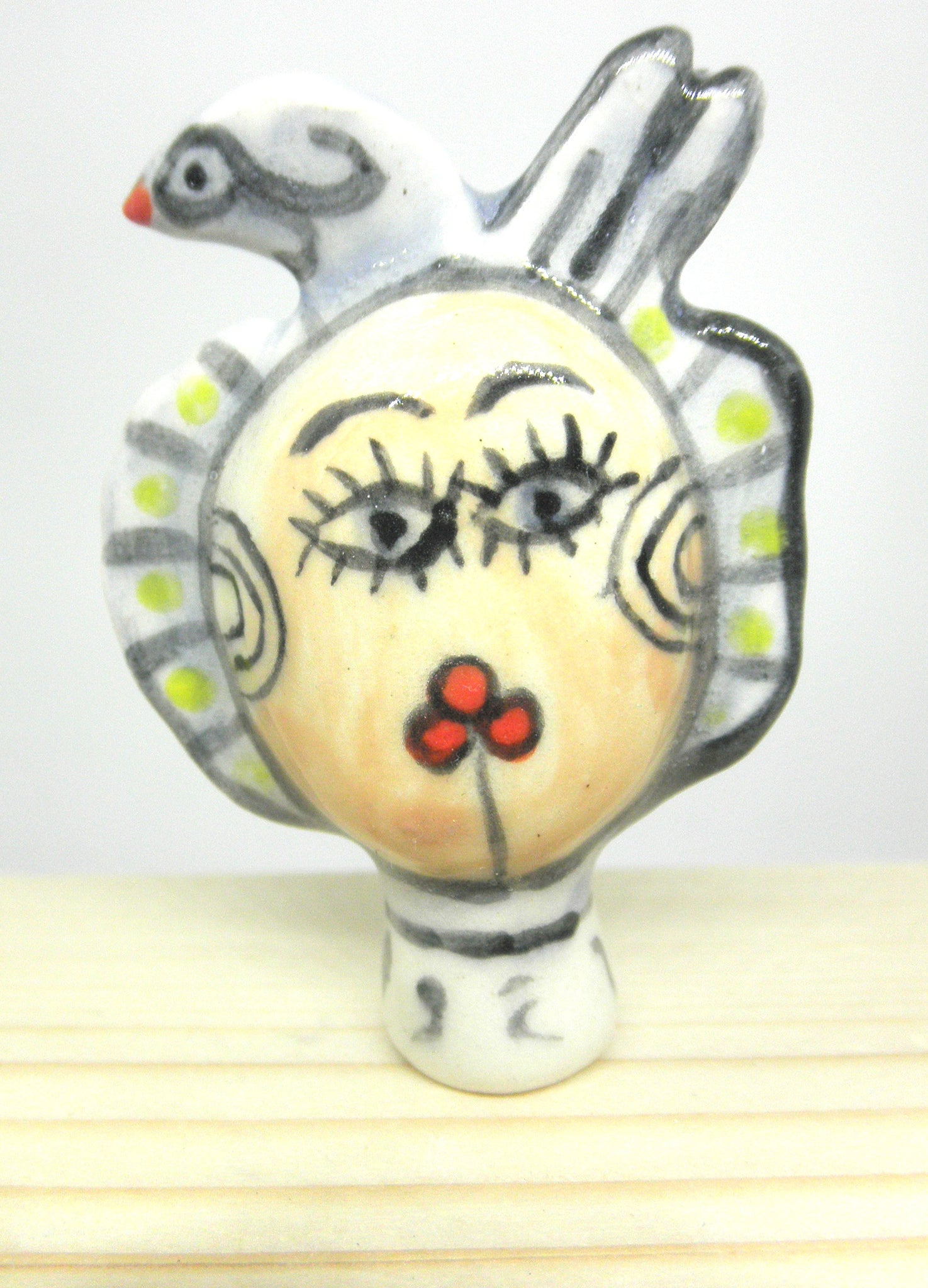 Miniature ceramic sculpture - Bird lady lime back