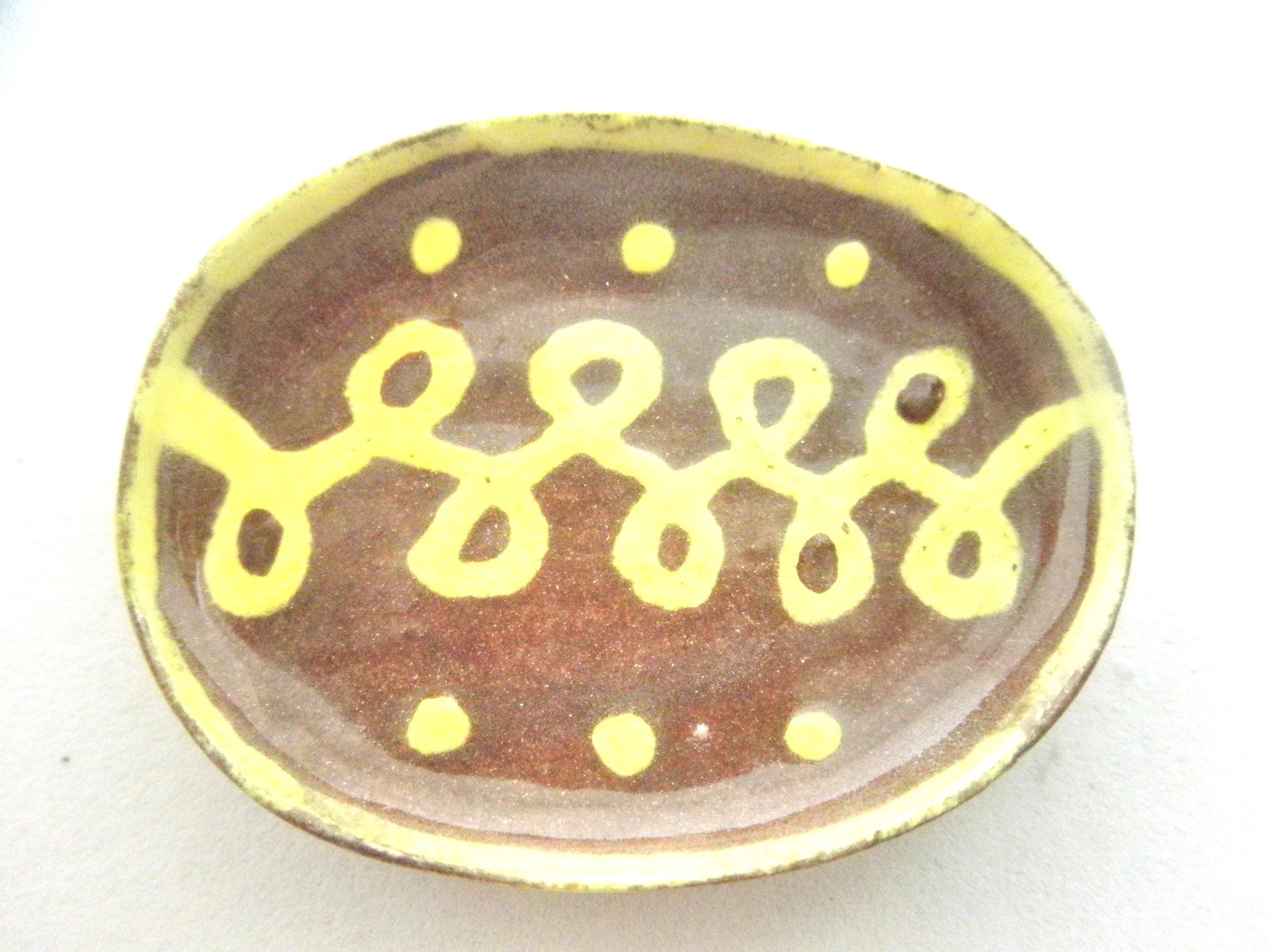 Miniature ceramic dish Pennsylvania slipware oblong interlaced loops