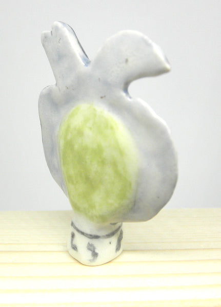 Miniature ceramic sculpture - Bird lady lime back