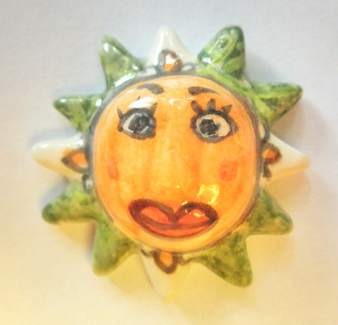 Miniature ceramic Mexican Sun sculpture with lilies