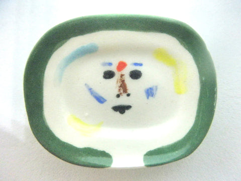 Miniature Picasso inspired ceramic plate -  face with green border