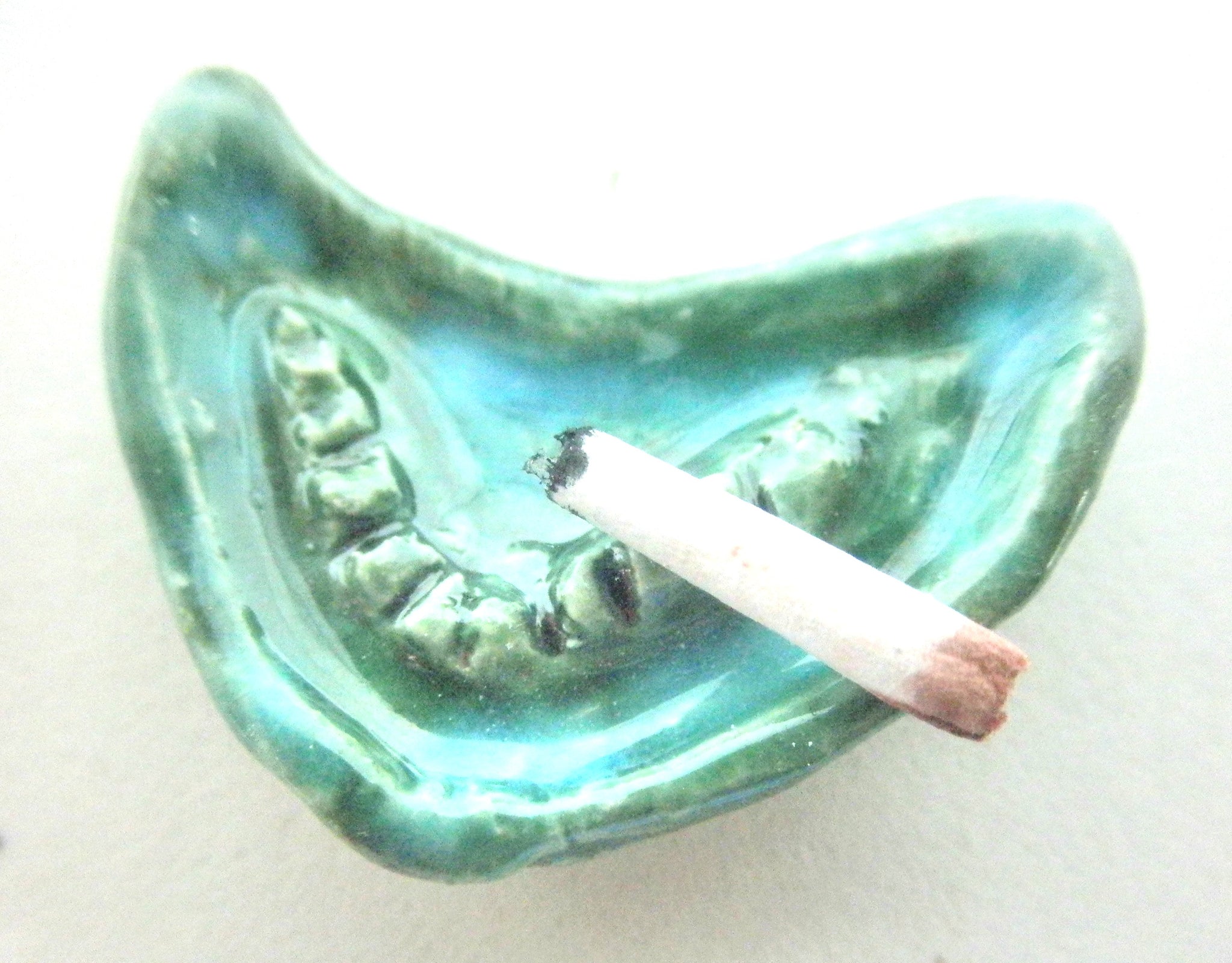 Miniature mid-century boomerang ashtray - green