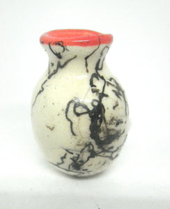 Miniature ceramic vase with hair decoration. #A