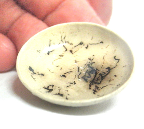 Miniature ceramic bowl with hair decoration. #B
