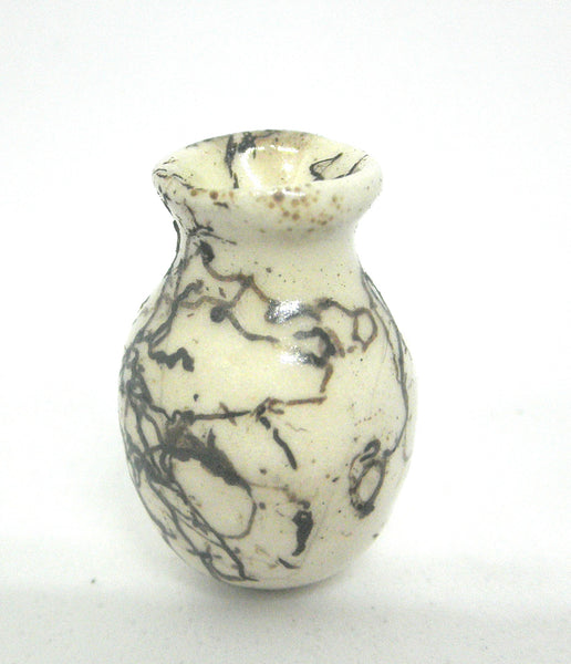 Miniature ceramic vase with hair decoration. #B