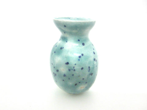 Miniature ceramic vase with flared top - speckled green