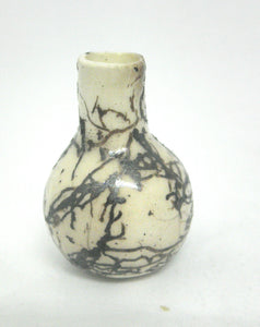 Miniature ceramic vase with hair decoration. #a