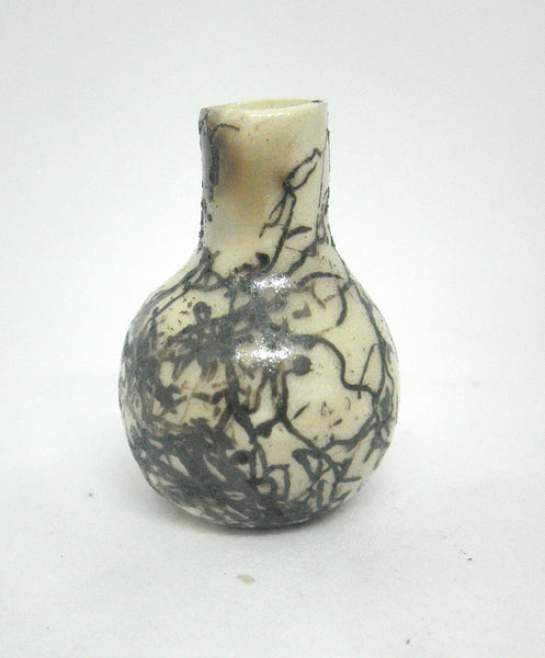 Miniature ceramic vase with hair decoration. #a