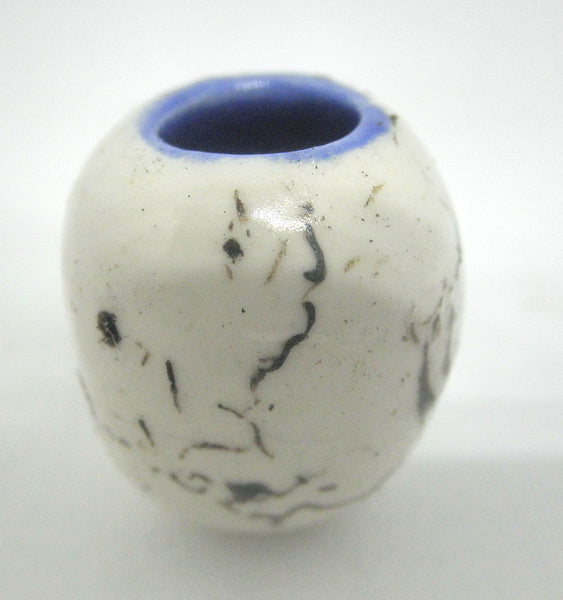 Miniature ceramic small vase with hair decoration. blue inside