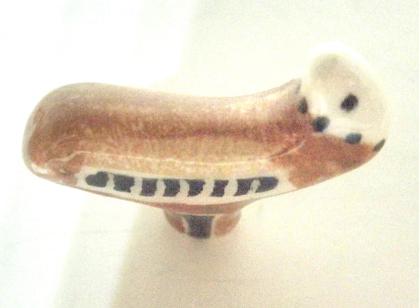 Miniature ceramic figurine stylized eagle brown