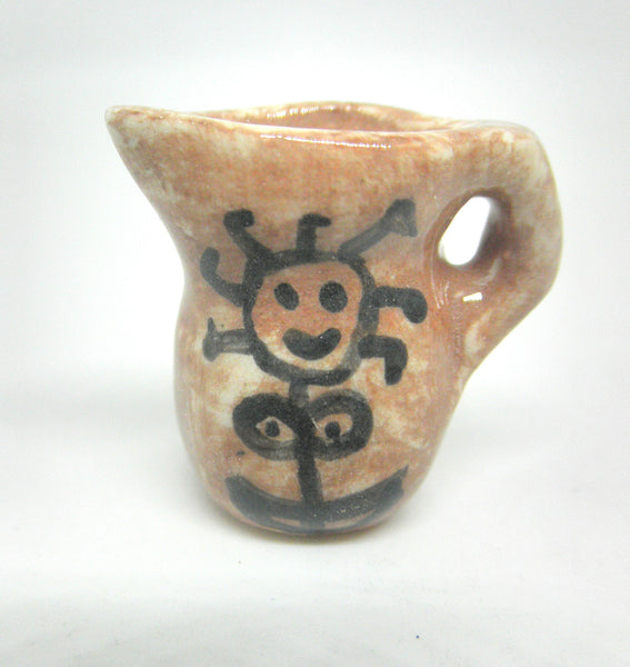 Miniature Picasso inspired pitcher - stylized woman on brown