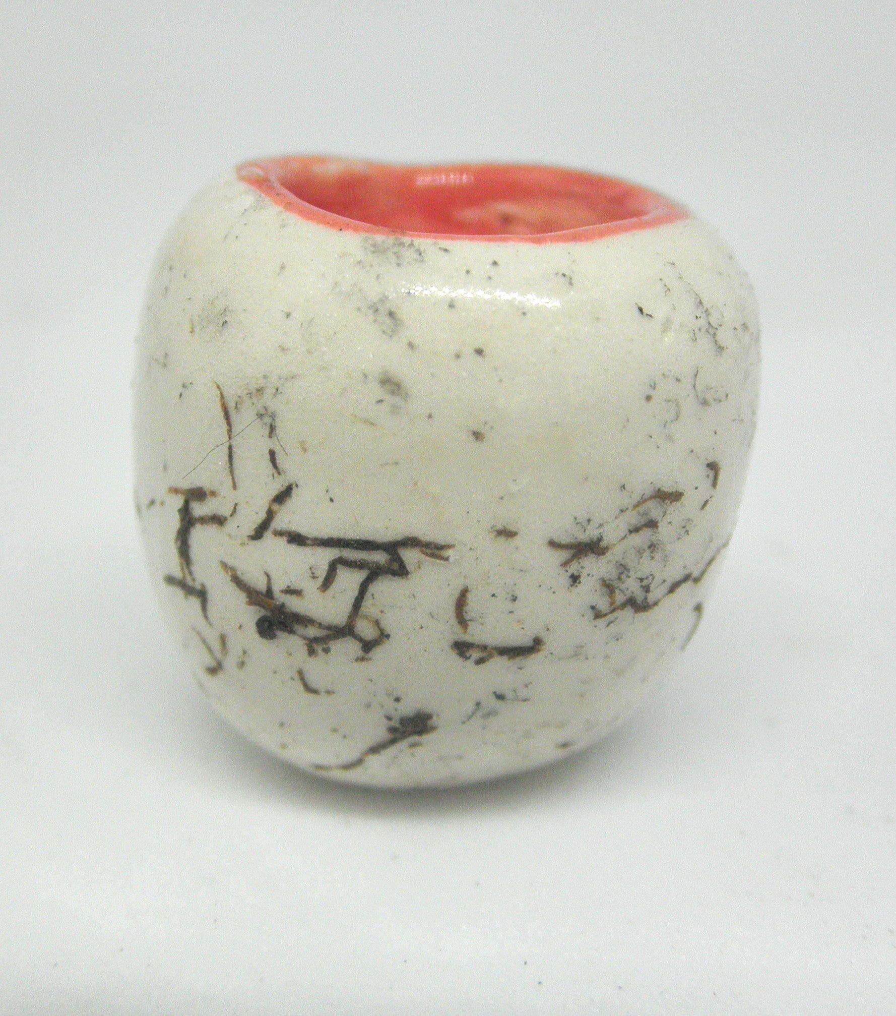 Miniature ceramic small vase with hair decoration. red inside