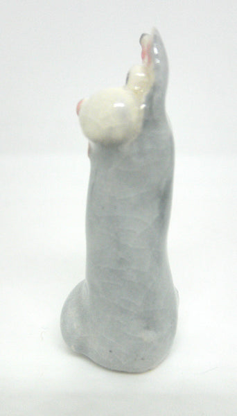 Miniature whimsical ceramic cat sculpture - grey