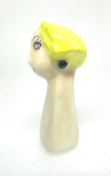 Miniature collector's art deco ceramic figurine woman with blond hair