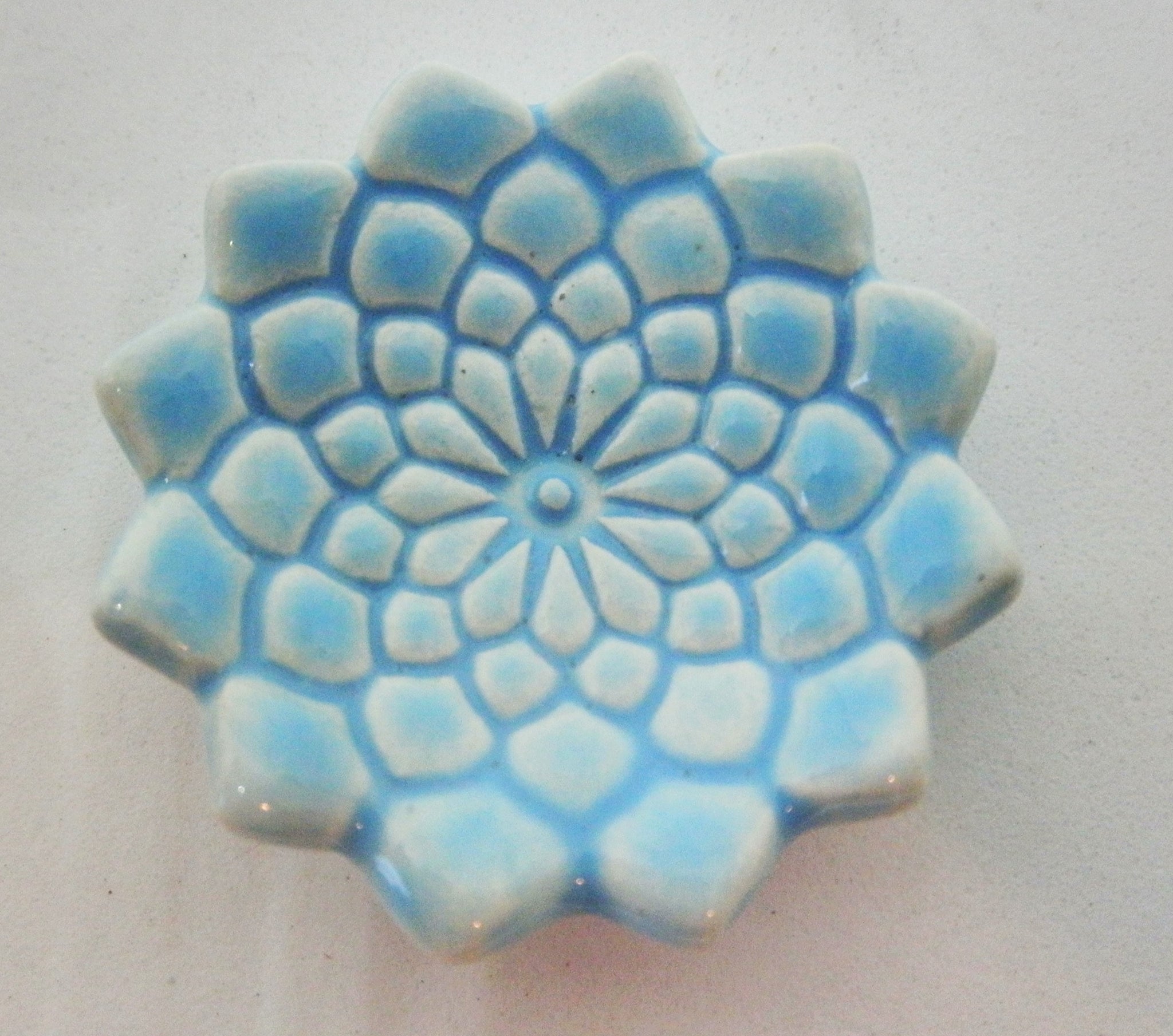 Miniature ceramic bowl textured blue with scalloped edges-medium