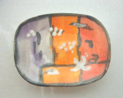 Miniature ceramic plate with blossom