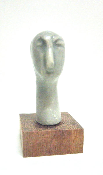Miniature ceramic sculpture of a head - Grey