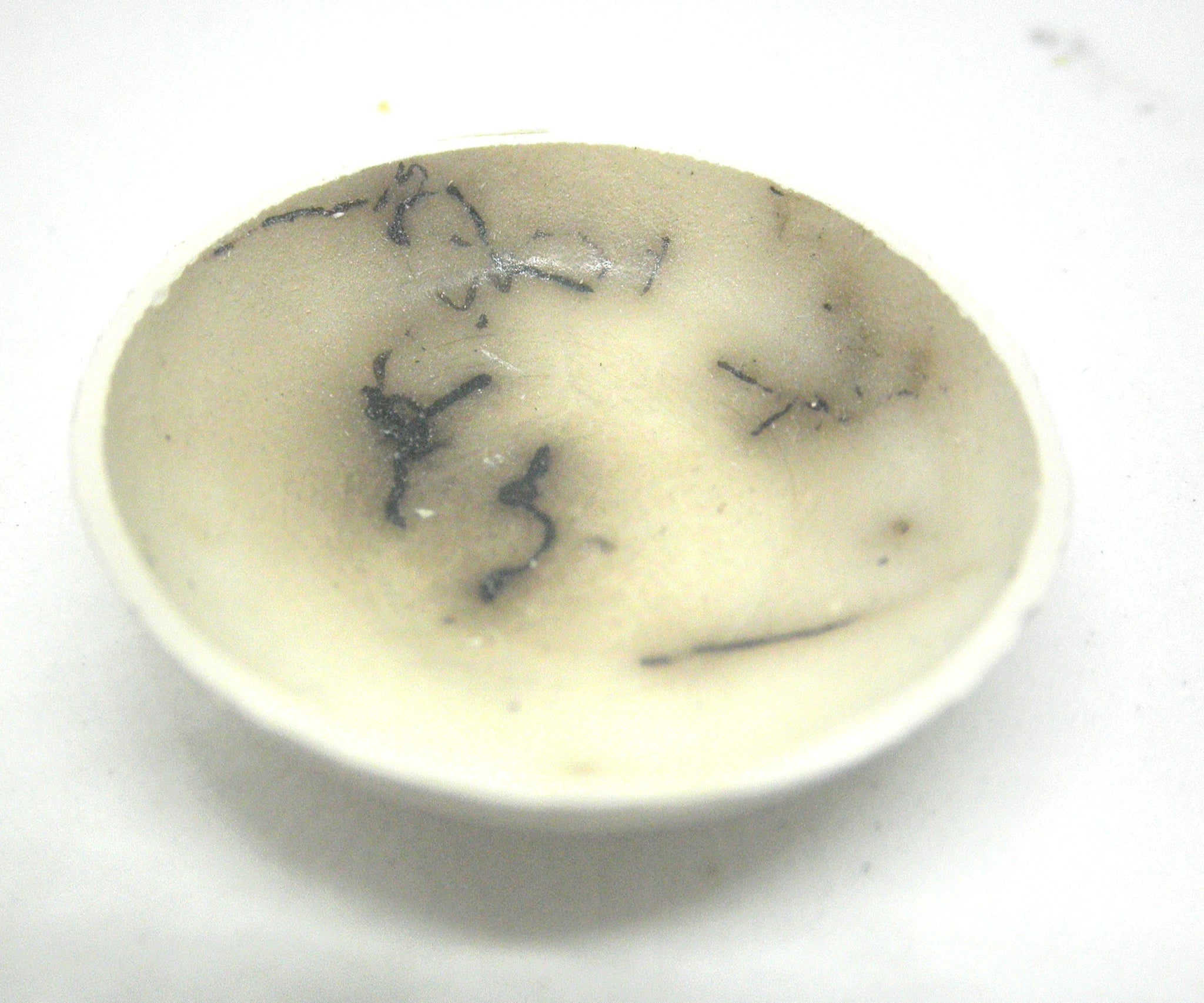 Miniature ceramic bowl with hair decoration. #B