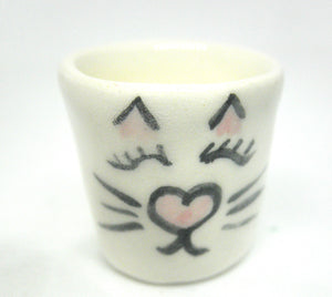 Miniature ceramic planter with cat face