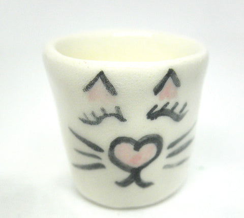 Miniature ceramic planter with cat face