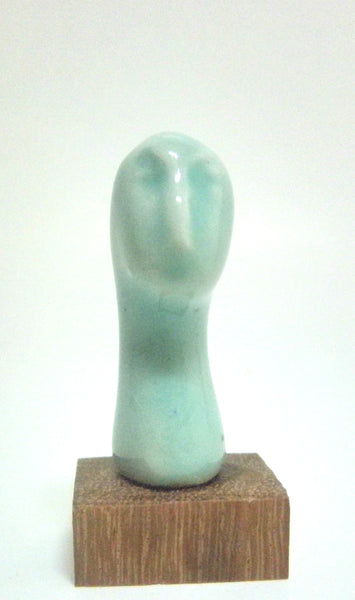 Miniature ceramic sculpture of a head - Light green