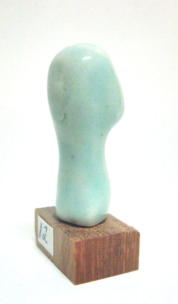 Miniature ceramic sculpture of a head - Light green