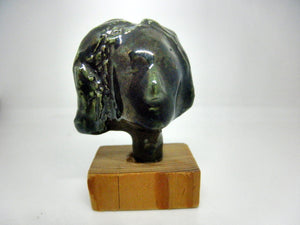Miniature ceramic collector woman's head sculpture - black
