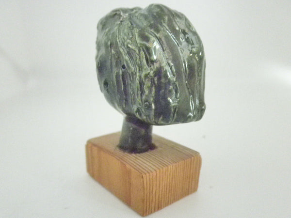 Miniature ceramic collector woman's head sculpture - black