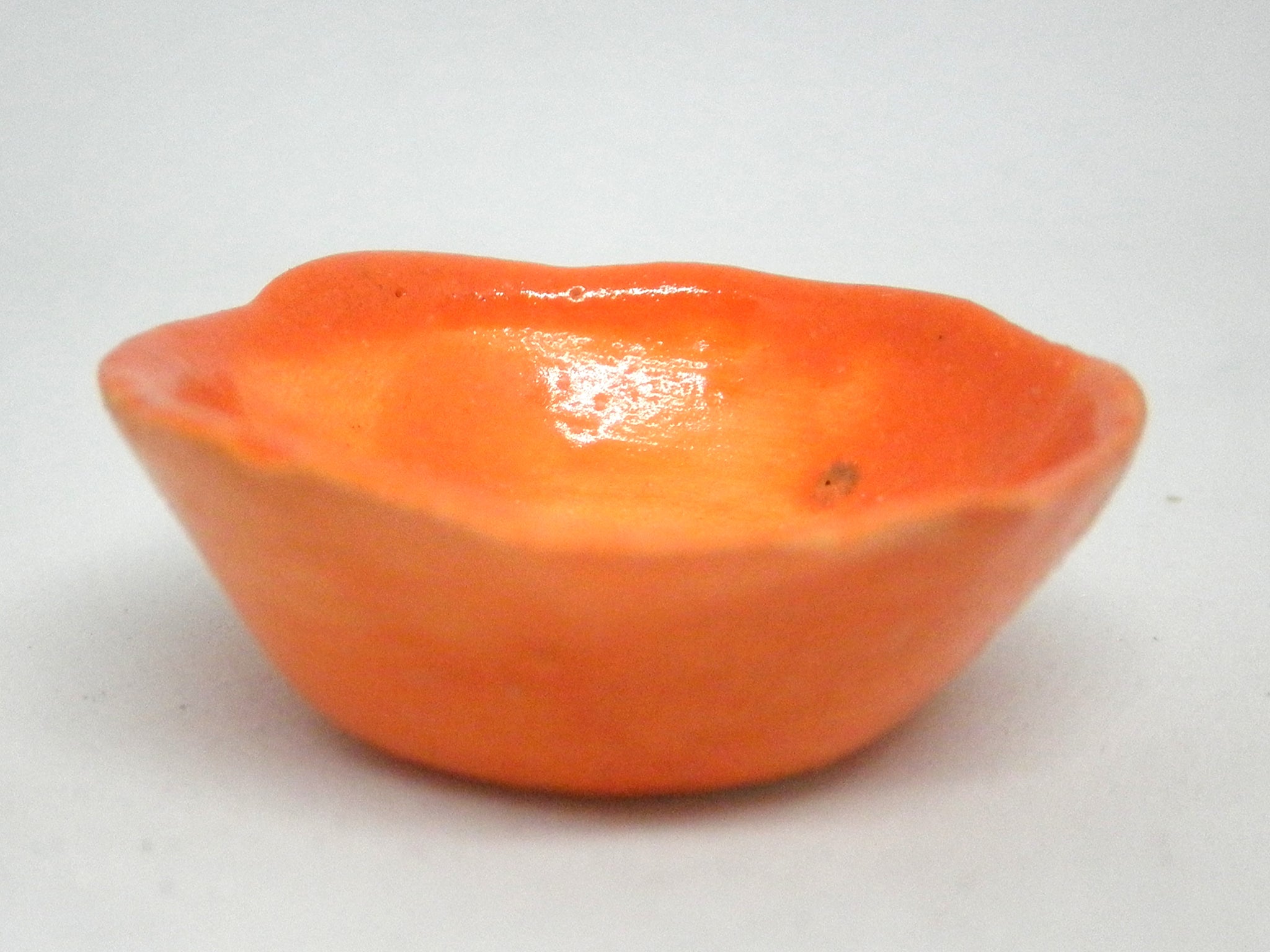 Miniature ceramic bowl orange