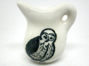 Miniature pitcher with owl