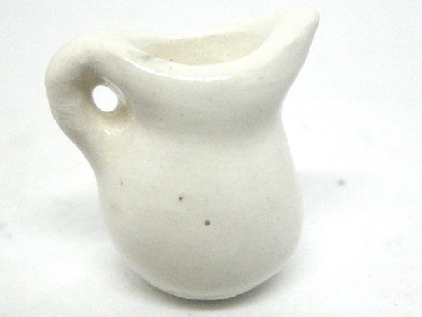 Miniature pitcher with owl