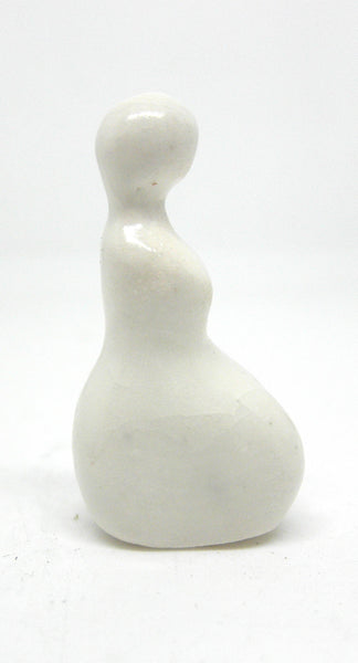 Miniature ceramic modern sculpture - kneeling woman in white