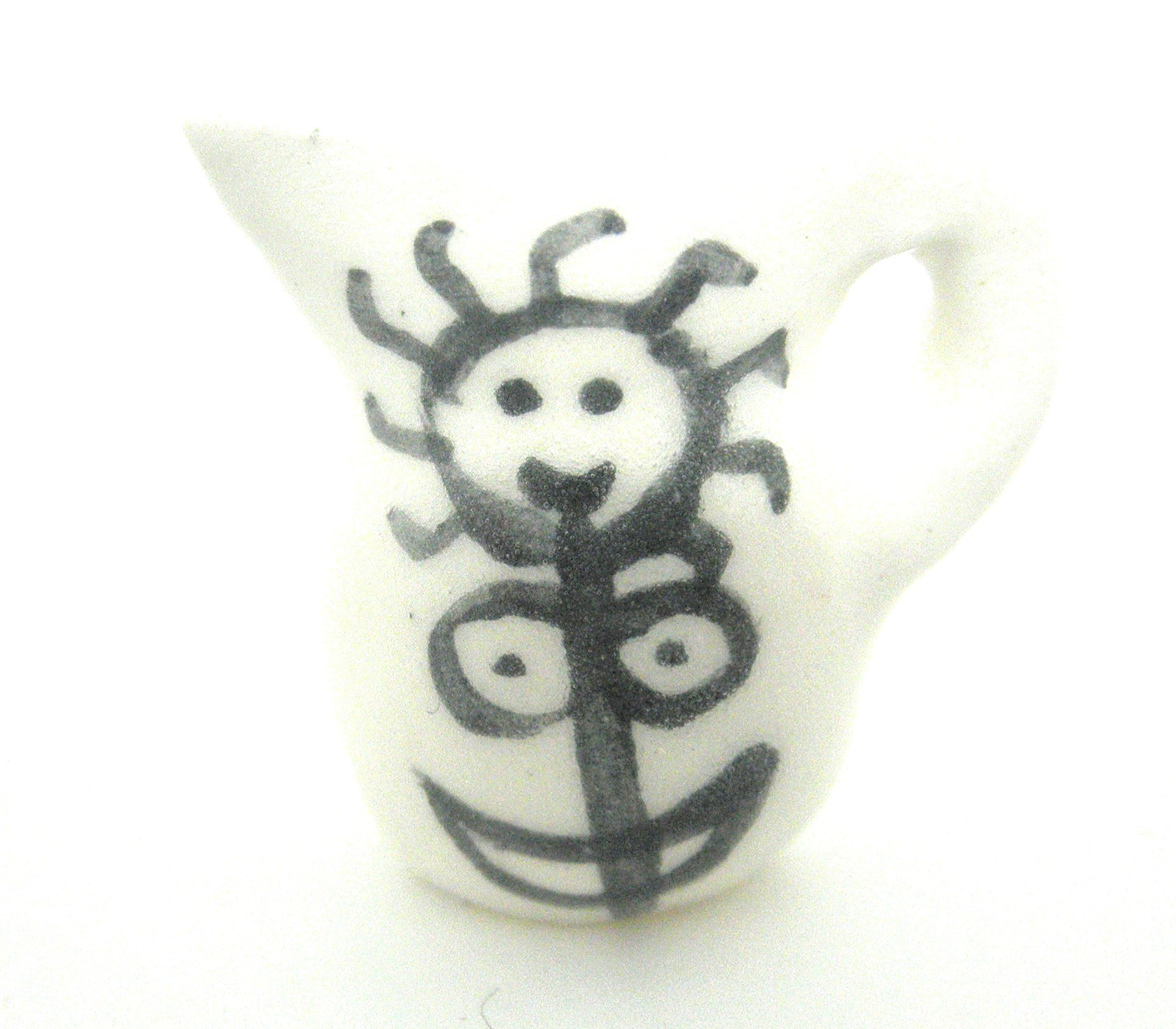 Miniature Picasso inspired pitcher - stylized woman on white.