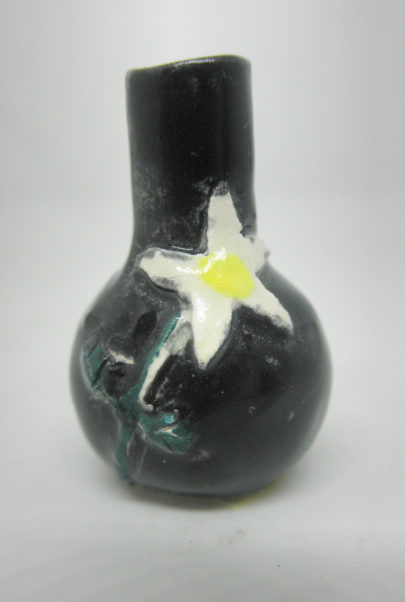 Miniature ceramic vase black with white flower