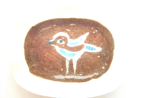 Miniature Picasso inspired ceramic plate -  bird on brown background