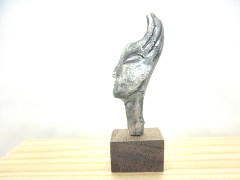 Miniature ceramic collector's profile sculpture - grey