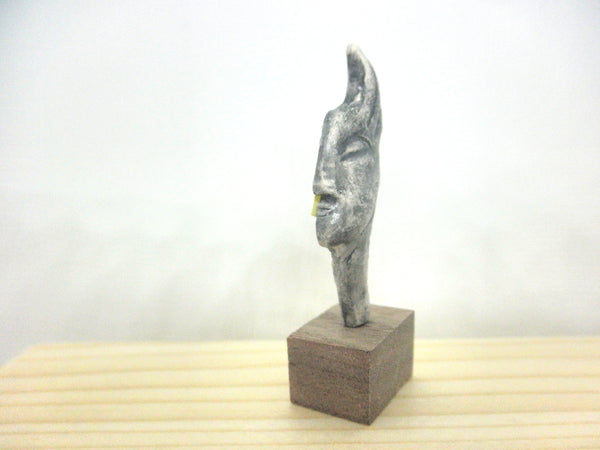 Miniature ceramic collector's profile sculpture - grey