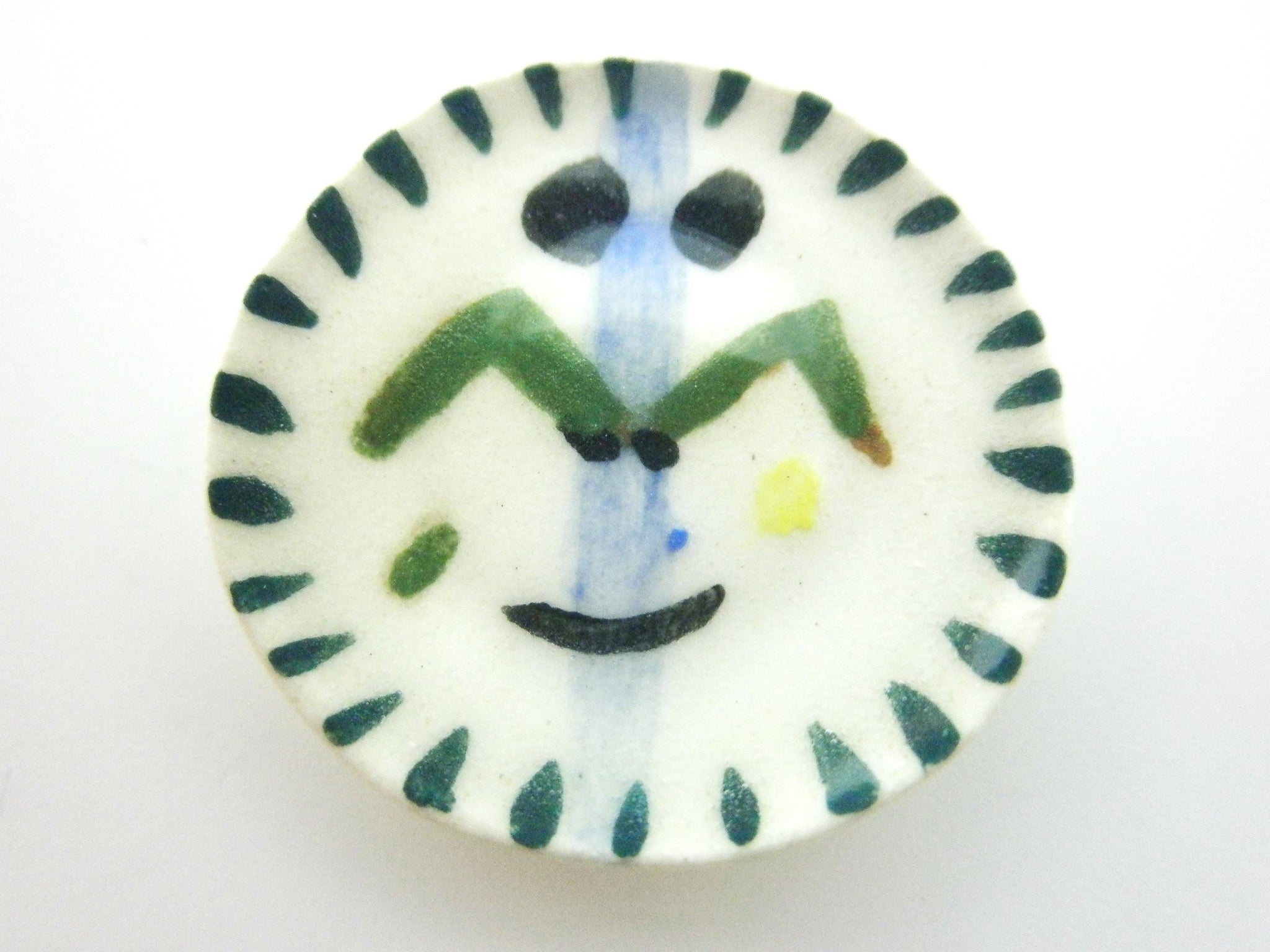 Miniature Picasso inspired small ceramic plate - face with blue stripe