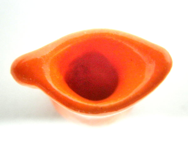 Miniature ceramic pitcher fiesta ware orange.
