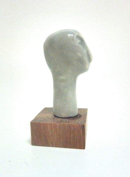 Miniature ceramic sculpture of a head - Grey