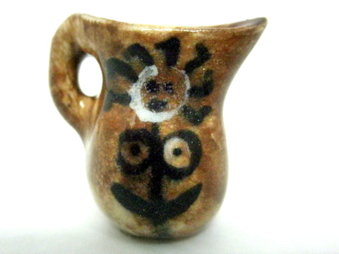 Miniature Picasso inspired pitcher - stylized woman on brown