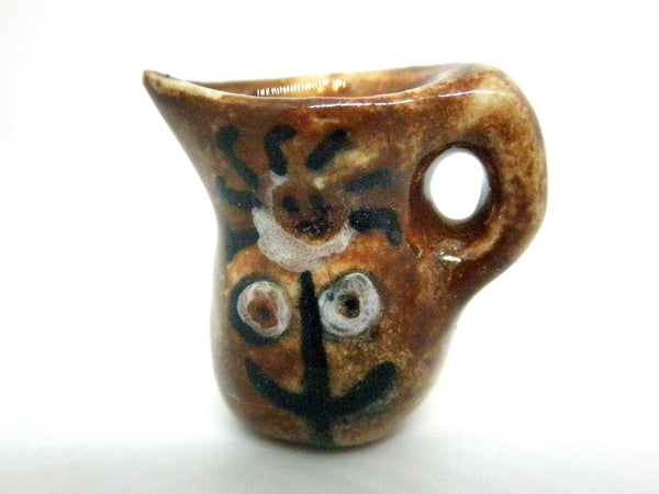 Miniature Picasso inspired pitcher - stylized woman on brown