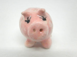 Miniature ceramic pink piggy bank