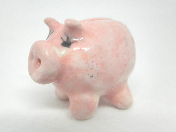 Miniature ceramic pink piggy bank