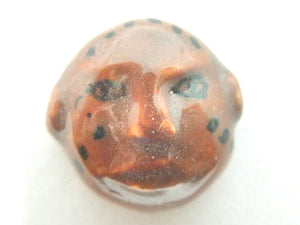 Miniature African art mask - round, brown