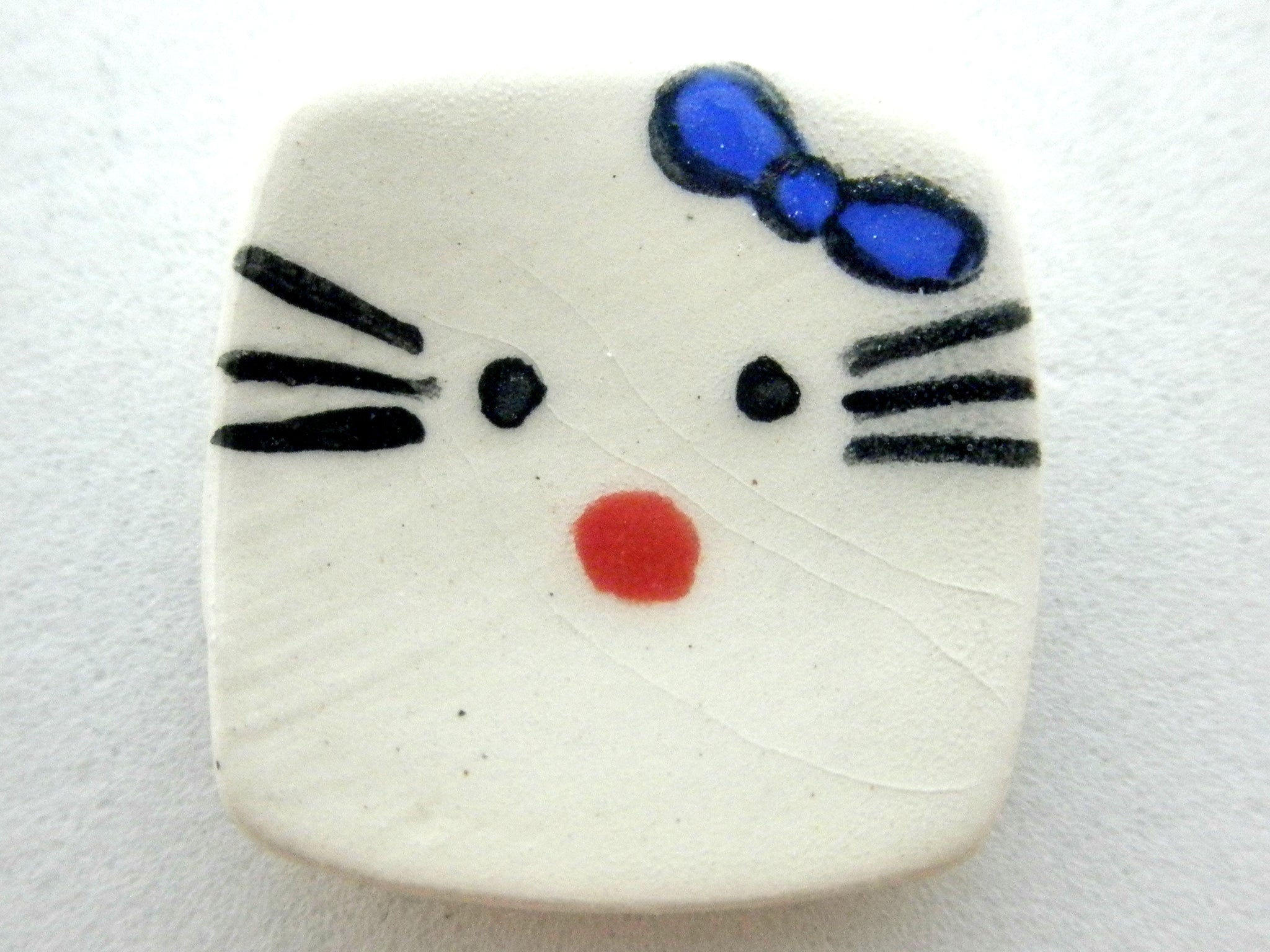 Miniature ceramic plate kitty blue bow