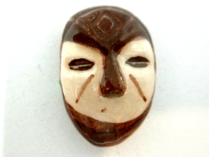 Miniature African art mask brown and beige