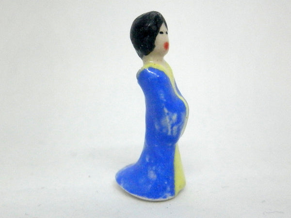 Miniature figurine of Japanese Lady in blue and yellow kimono