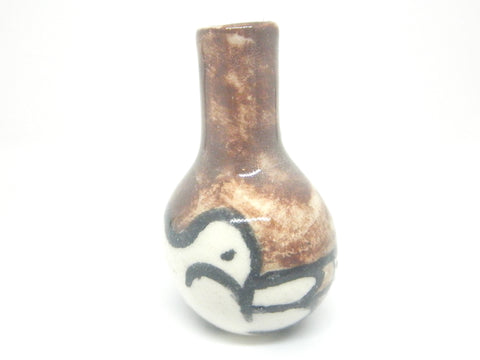 Miniature handmade small brown ceramic Peruvian vase with bird
